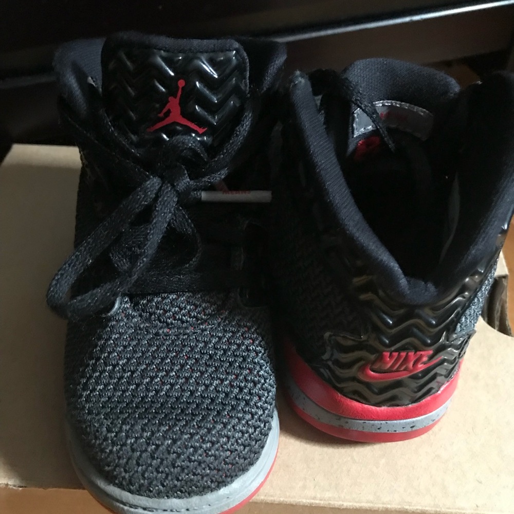 Baby size 6 pair of red and black Jordan